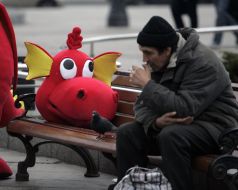 A man smokes near Dragon head