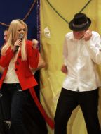 Mika Newton performs at a concert