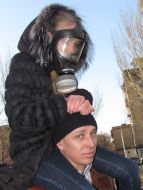 A girl in a gas-mask