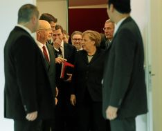Klaus Schwab, Angela Merkel