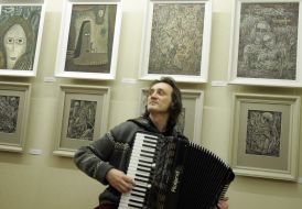 A man plays the squeeze-box 