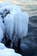 Icicles on an off-shore stone