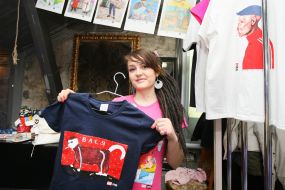 A girl demonstrates a sport shirt