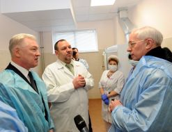 Alexandr Anishchenko and Nikolay Azarov in a clinical cancer center