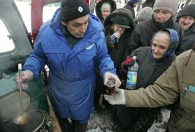 Movable point of distribution of warm clothes and meal