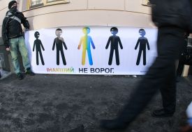 Protester holds placard