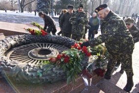 Laying flowers at the Eternal Flame