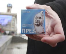 The participant of action holds a box with a contraceptive