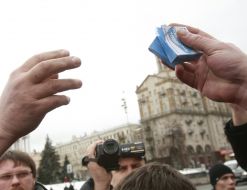 The participant of action holds a box with a contraceptive