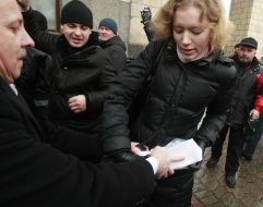 The participant of action holds a box with a contraceptive