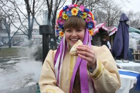 The girl eats a pancake