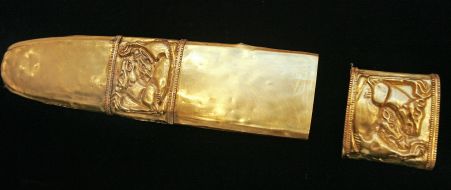 Gold pads on the scabbard of the sword