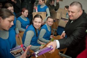 Aleksandr Krikushenko gives a presents