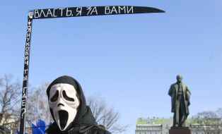 A young man in a mask of death
