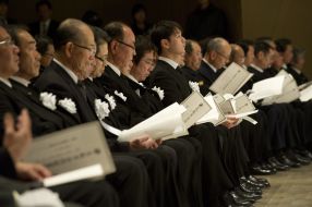 Participants of plaintive ceremony