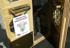 The poster with a picture of a chicken carcass