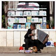 Gypsy plays the accordion