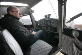 Sergey Shevchuk near the Cessna-140 aircraft