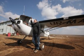 Sergey Shevchuk near the Cessna-140 aircraft