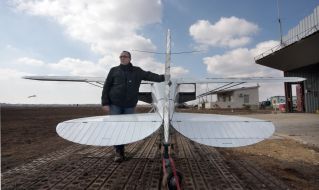 Sergey Shevchuk near the Cessna-140 aircraft