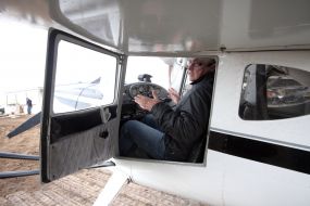 Sergey Shevchuk near the Cessna-140 aircraft