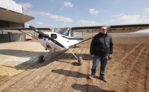 Sergey Shevchuk near the Cessna-140 aircraft