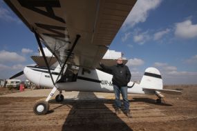 Sergey Shevchuk near the Cessna-140 aircraft