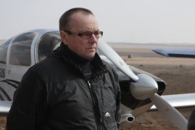 Sergey Shevchuk near the RV-10 aircraft