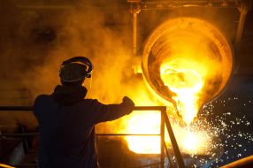 The worker of factory in melt department