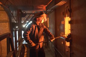 The worker of factory in melt department