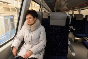 A woman in the salon of train