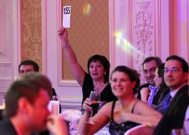 Participants in a charity auction