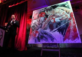 Yuriу Gorbunov shows a picture of Armin Flossdorfa