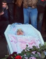 Coffin with the body of Oksana Makar