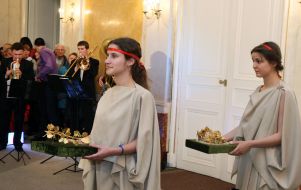 Models are antique gold wreaths