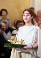 Models are antique gold wreaths