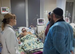 Moshe Asman near the beaten student Alexandr-Aaron Goncharov