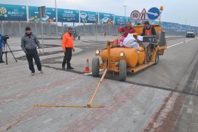 Machine for road marking