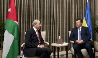 Viktor Yanukovich and  Tager al-Masri