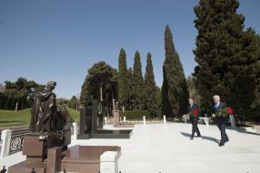 Vladimir Litvin laying flowers