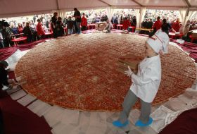 Preparation of the biggest pizza in Ukraine