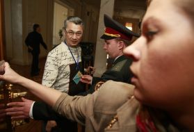 Journalists at the door in the press box in Parliament