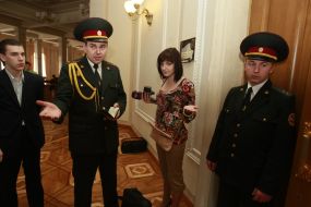 Journalists at the door in the press box in Parliament