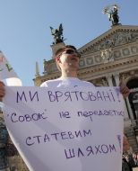 Participant of monstration with poster