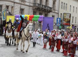 Participant of festive parade in the suit of king Danilo Galitskiy