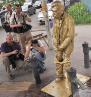 Photographers at the monument to Stalin