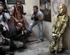 Photographers at the monument to Stalin