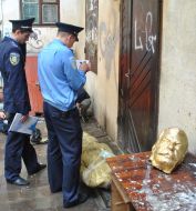 AMilitiamen stand near the head of Stalin