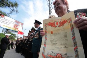 Yevdokiya Kornyukhina holds a testimonial letter
