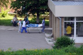 Doctors with patient